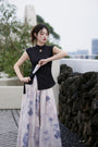 Elegant Black Cheongsam Top and Floral Maxi Culotte Set