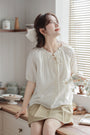 Whimsical Ivory Button-Front Blouse - Masion Chérie