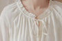 Whimsical Ivory Button-Front Blouse - Masion Chérie