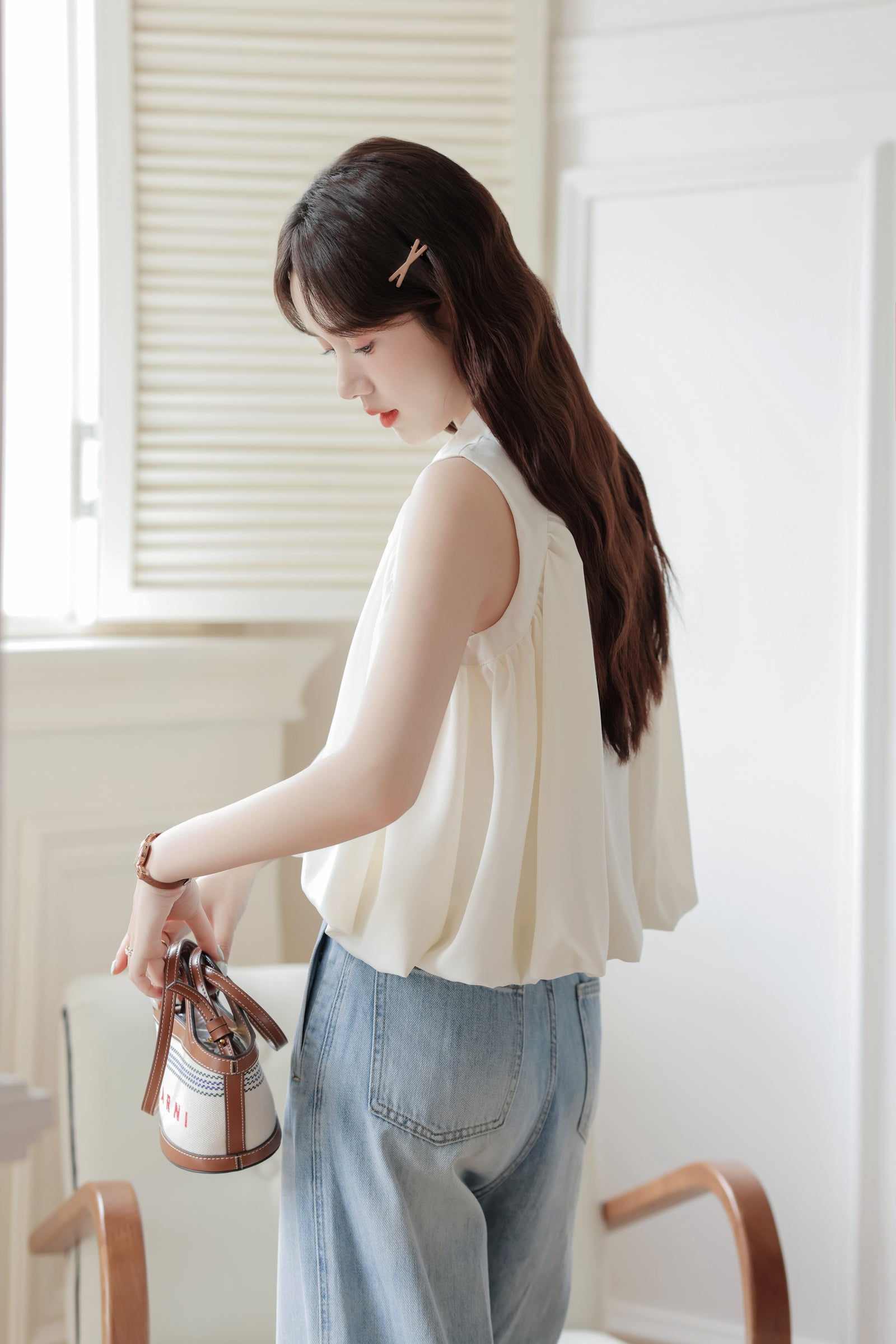 Chic Ivory Sleeveless Blouse - Masion Chérie