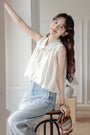 Chic Ivory Sleeveless Blouse - Masion Chérie