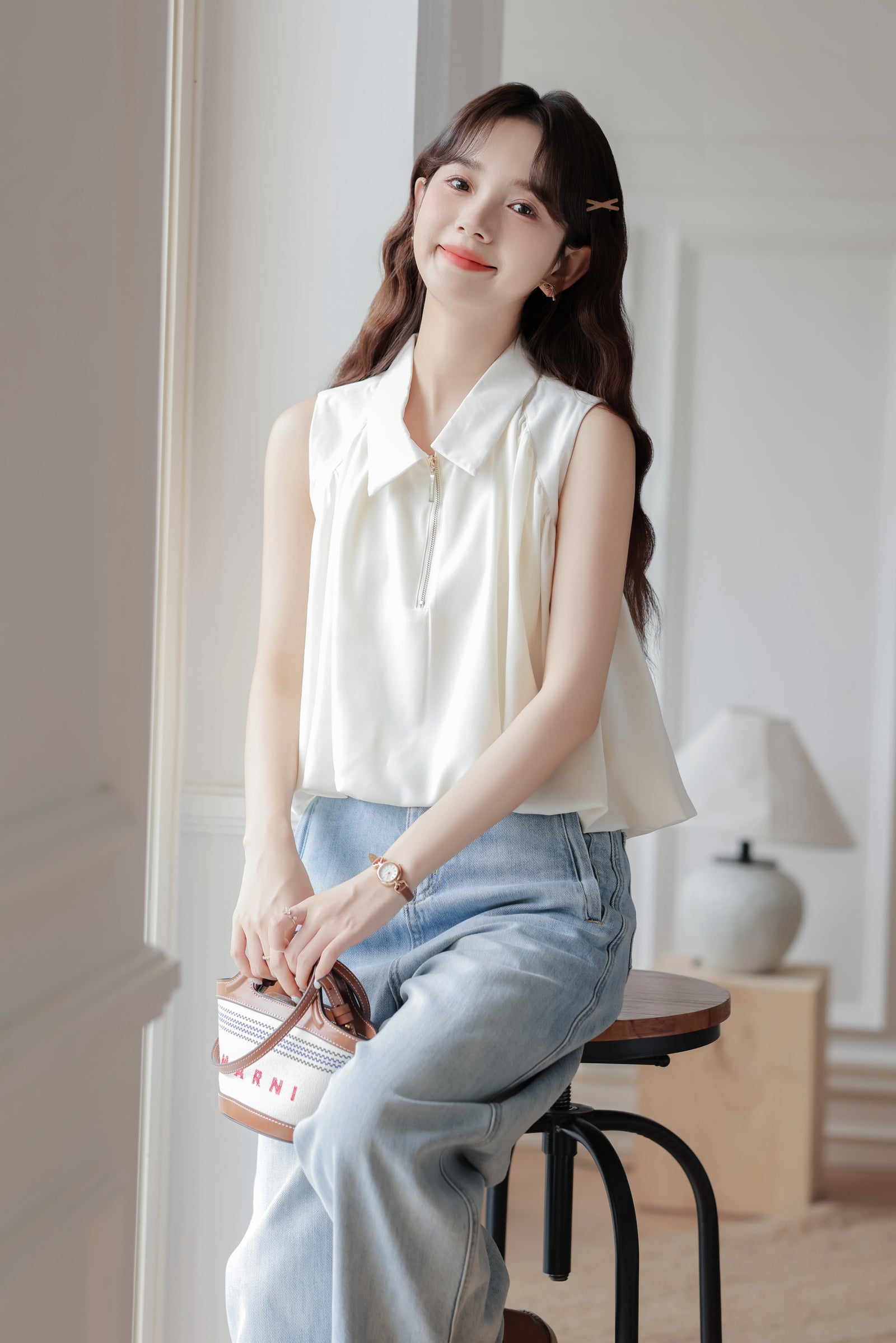 Chic Ivory Sleeveless Blouse - Masion Chérie