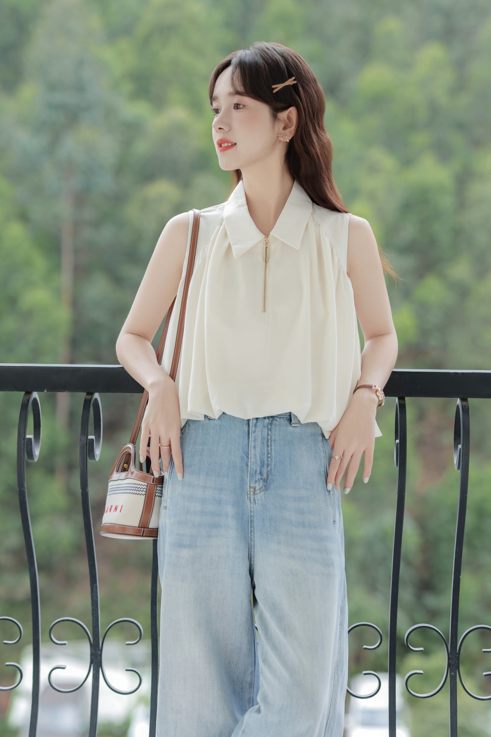 Chic Ivory Sleeveless Blouse - Masion Chérie